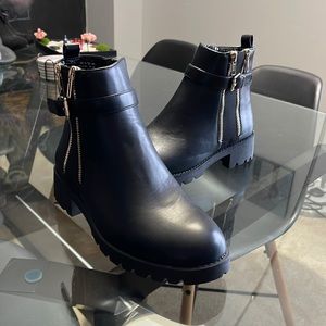 black leather zip ankle boots